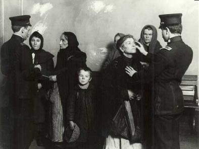 Immigration officials perform medical examinations.