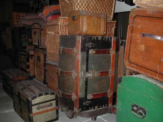 Parts of an interior exibit showing items used by immigrants to America. 